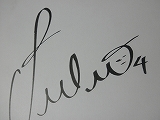 トゥーリオのサイン色紙
